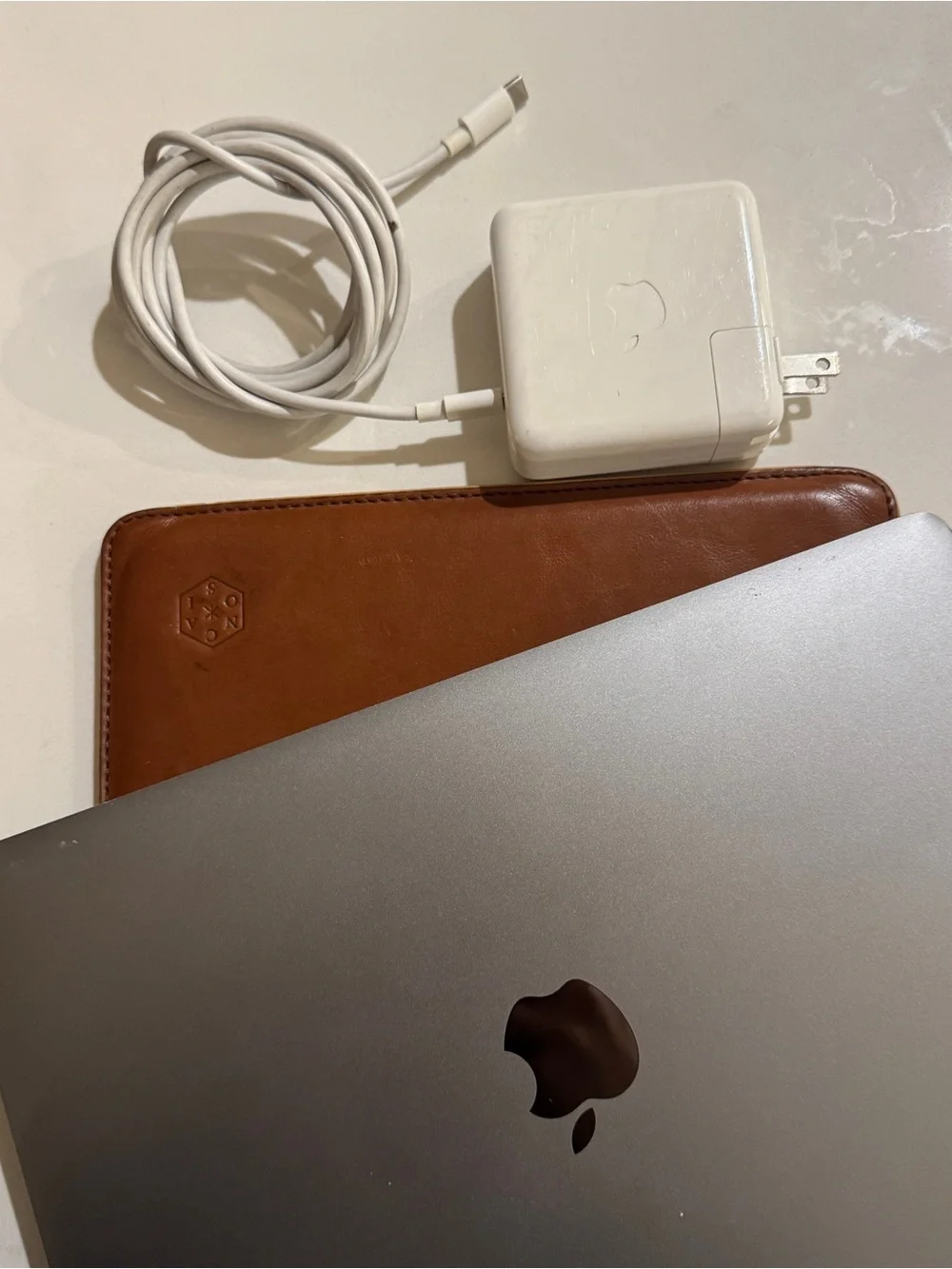 Used 2015 Apple MacBook in Space Gray with Charger and Sleeve case